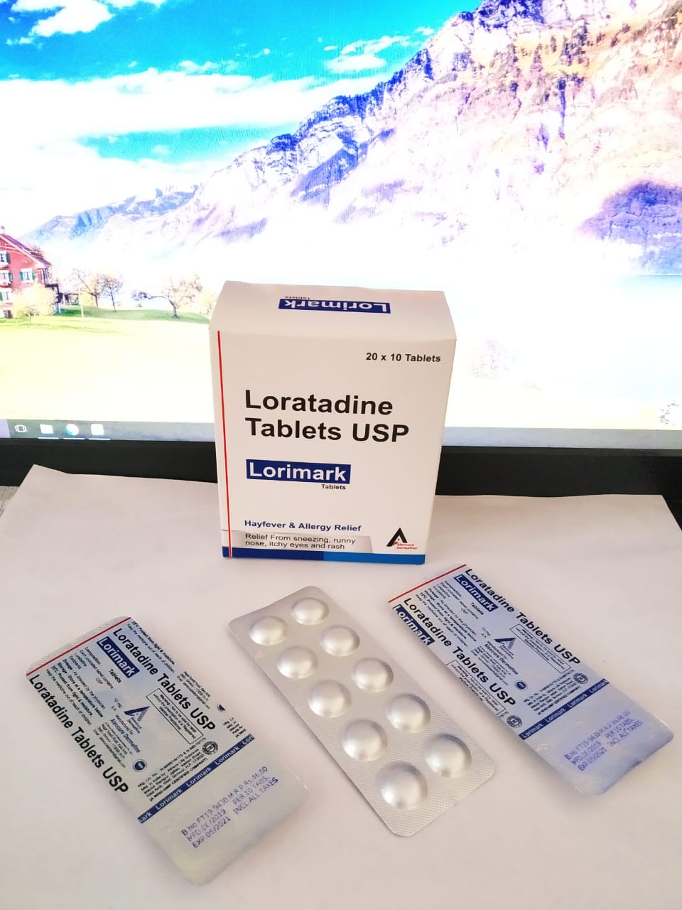 Product Name: LORIMARK, Compositions of LORIMARK are Loratadine Tablets USP - Alencure Biotech Pvt Ltd